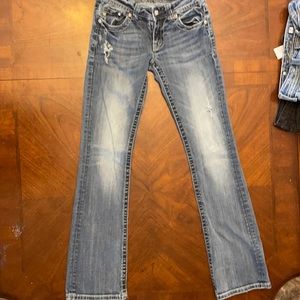 Miss Me Jeans, Bootcut, lighter wash color, Size 27, Good condition.